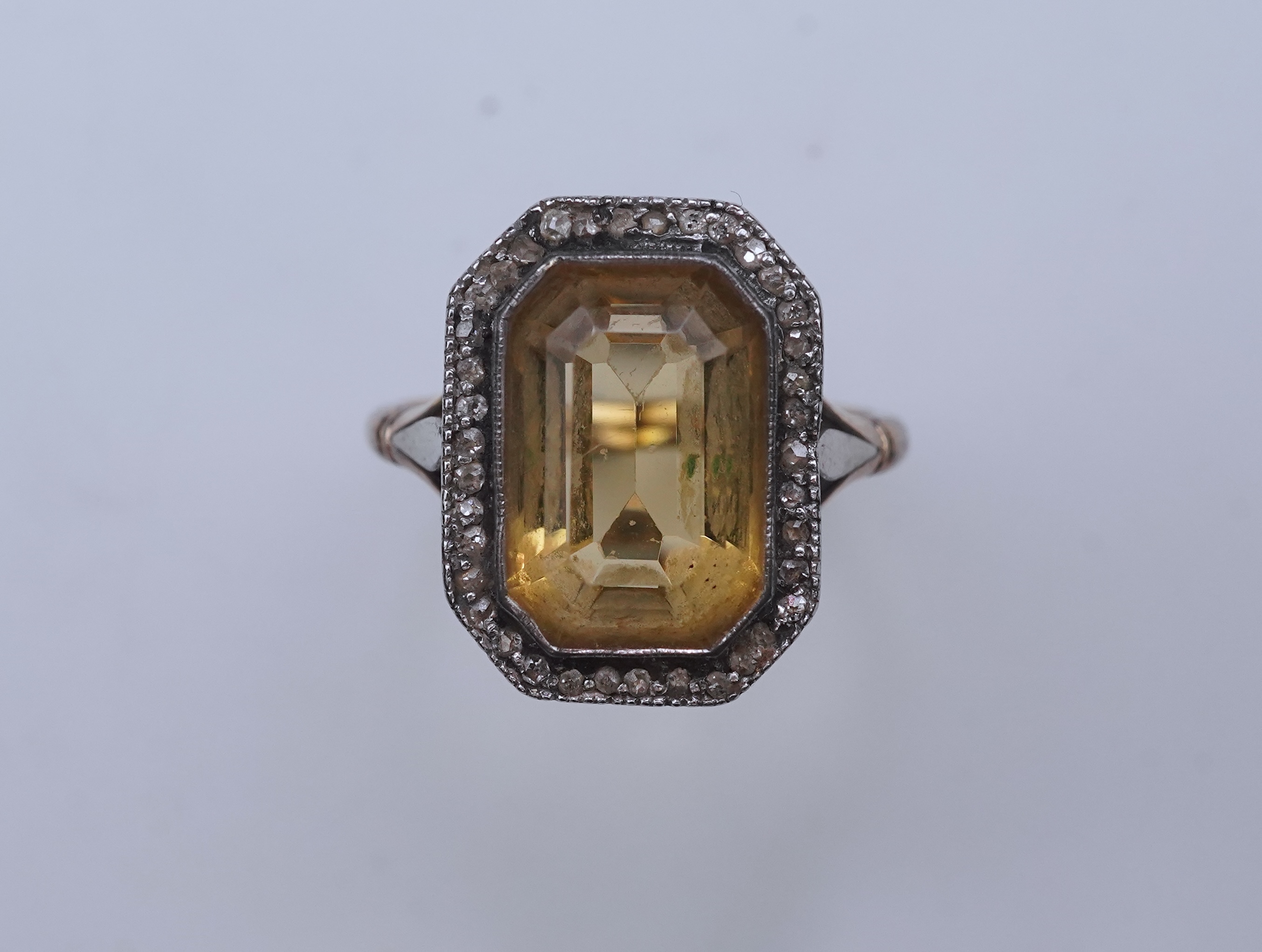 A citrine and diamond ring, early 20th century